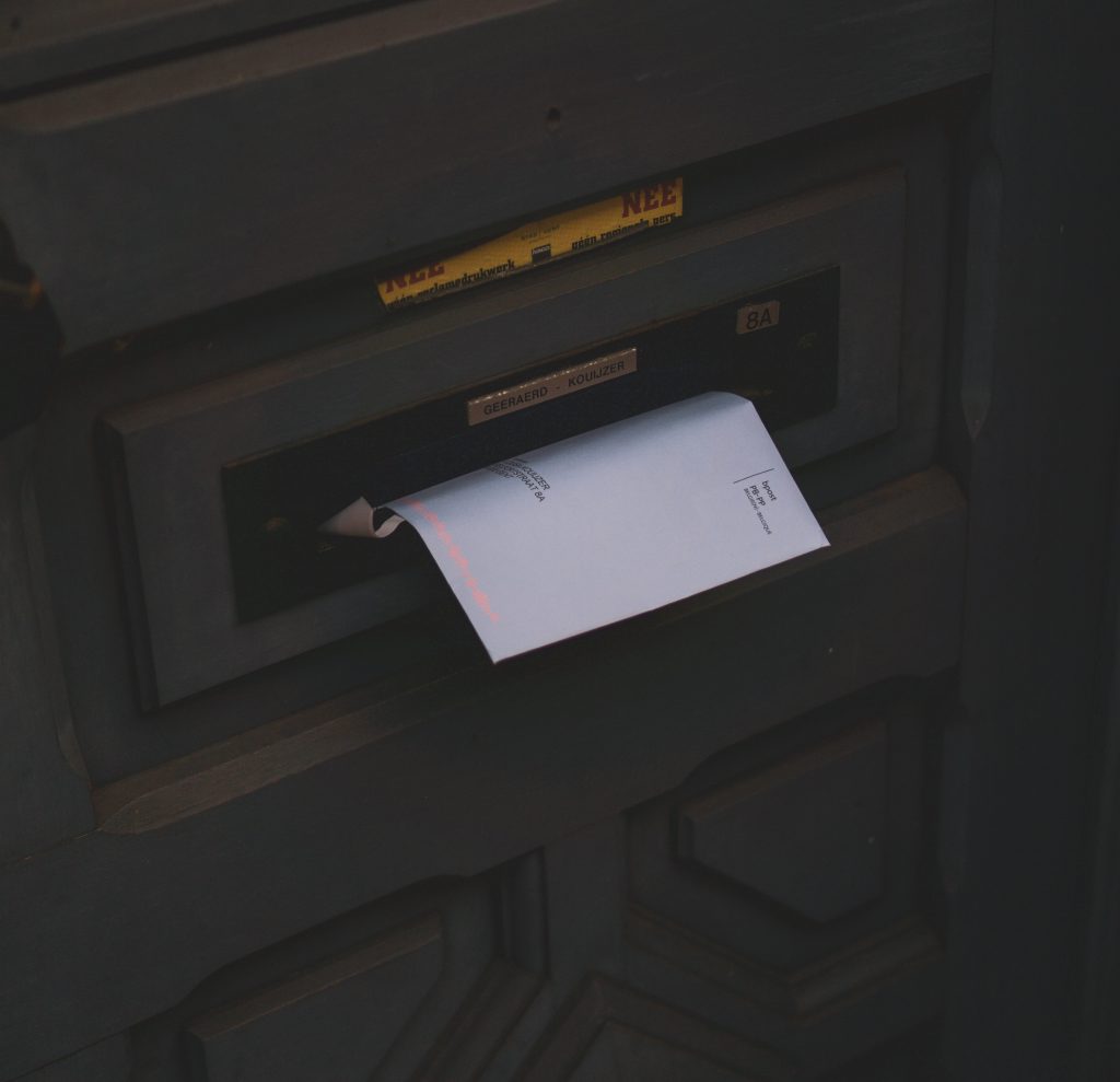 Letter in mail slot
